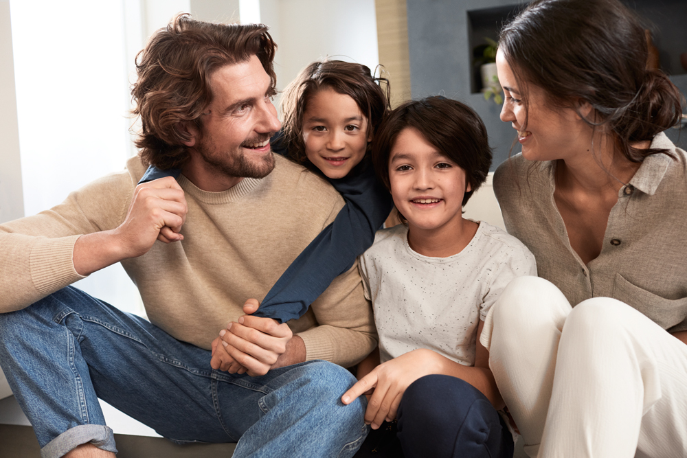 a happy family with two children