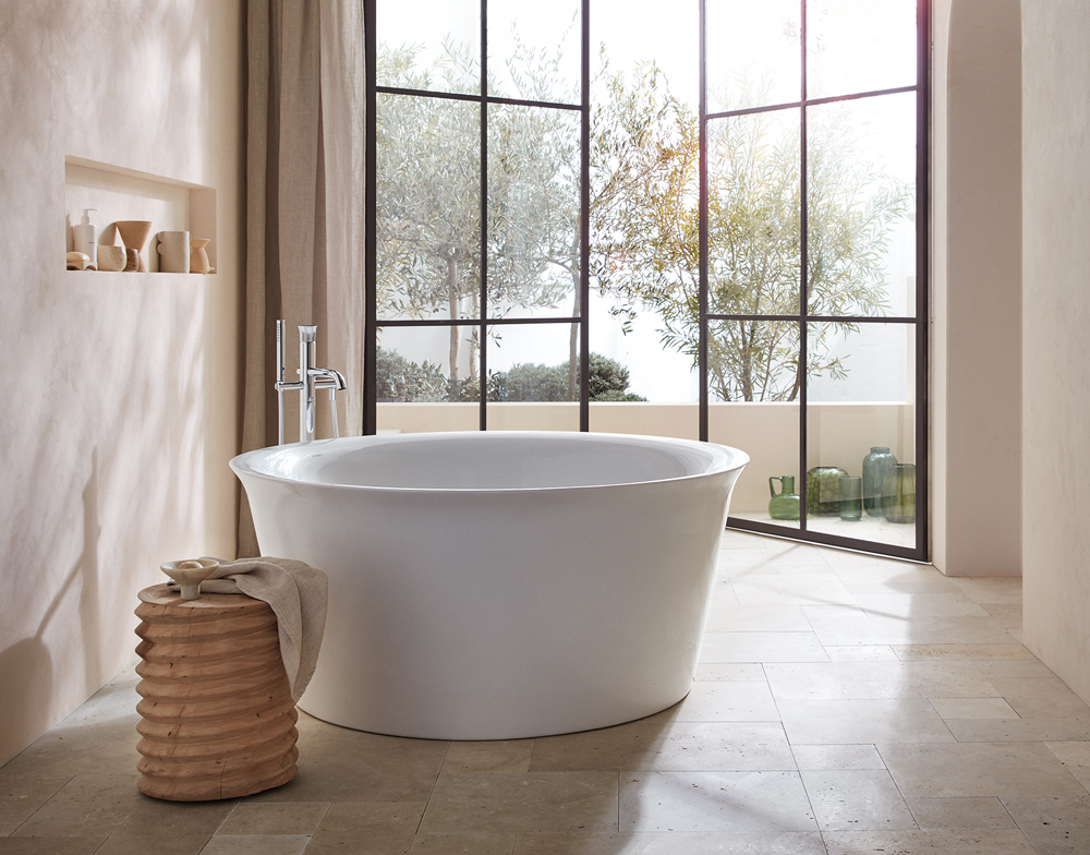 Mediterranean bathroom with freestanding WhiteTulip bathtub
