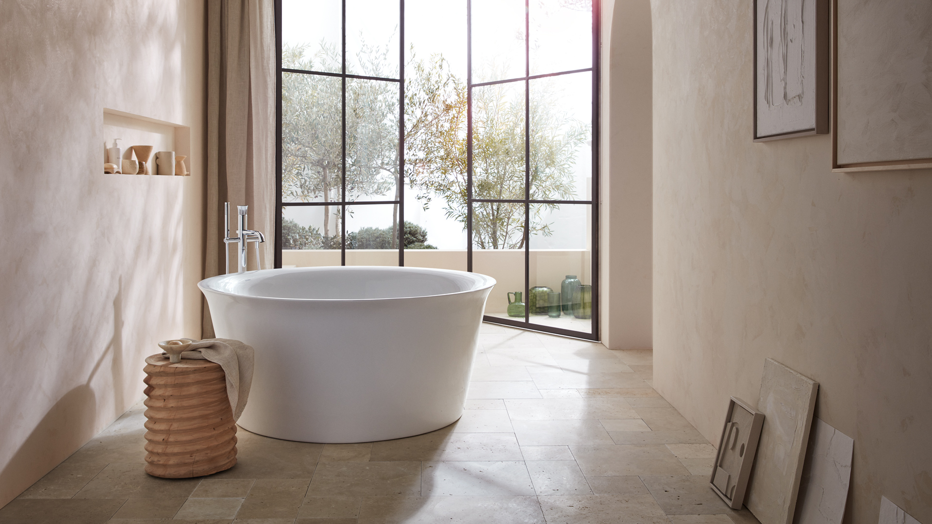 Mediterranean bathroom with freestanding bathtub
