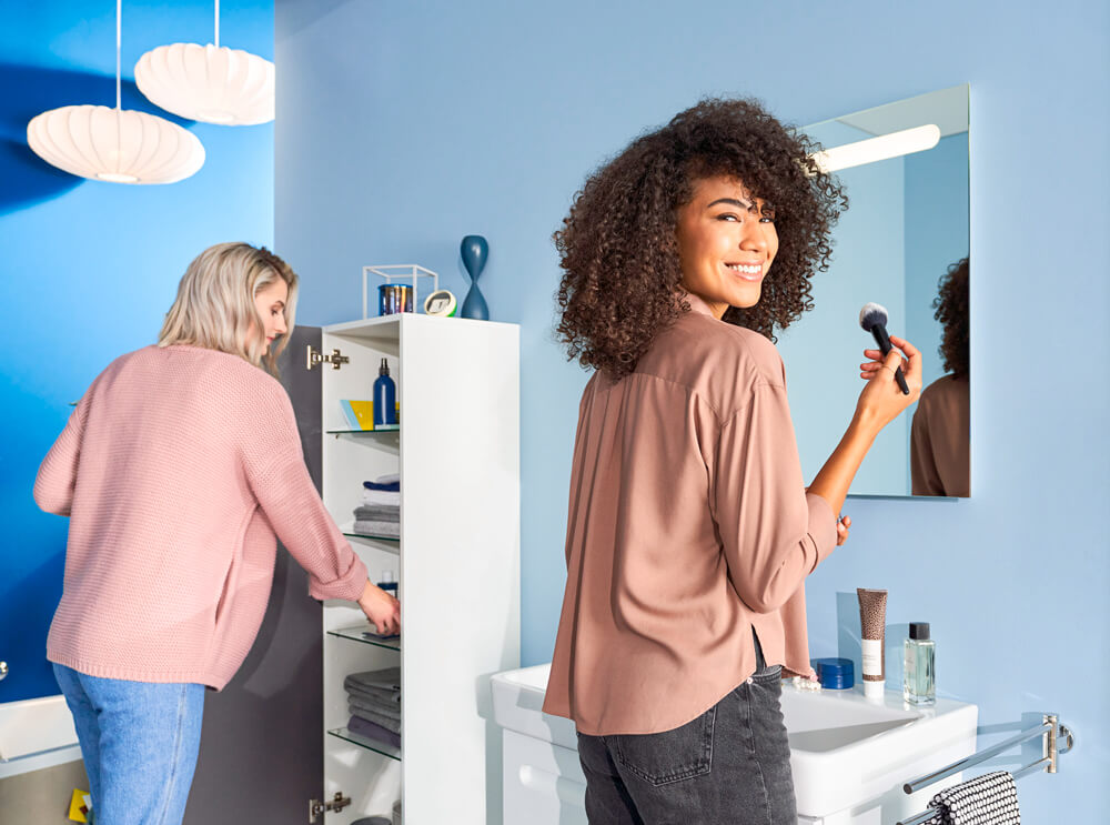 Two women in bathroom with Duravit No.1 furniture
