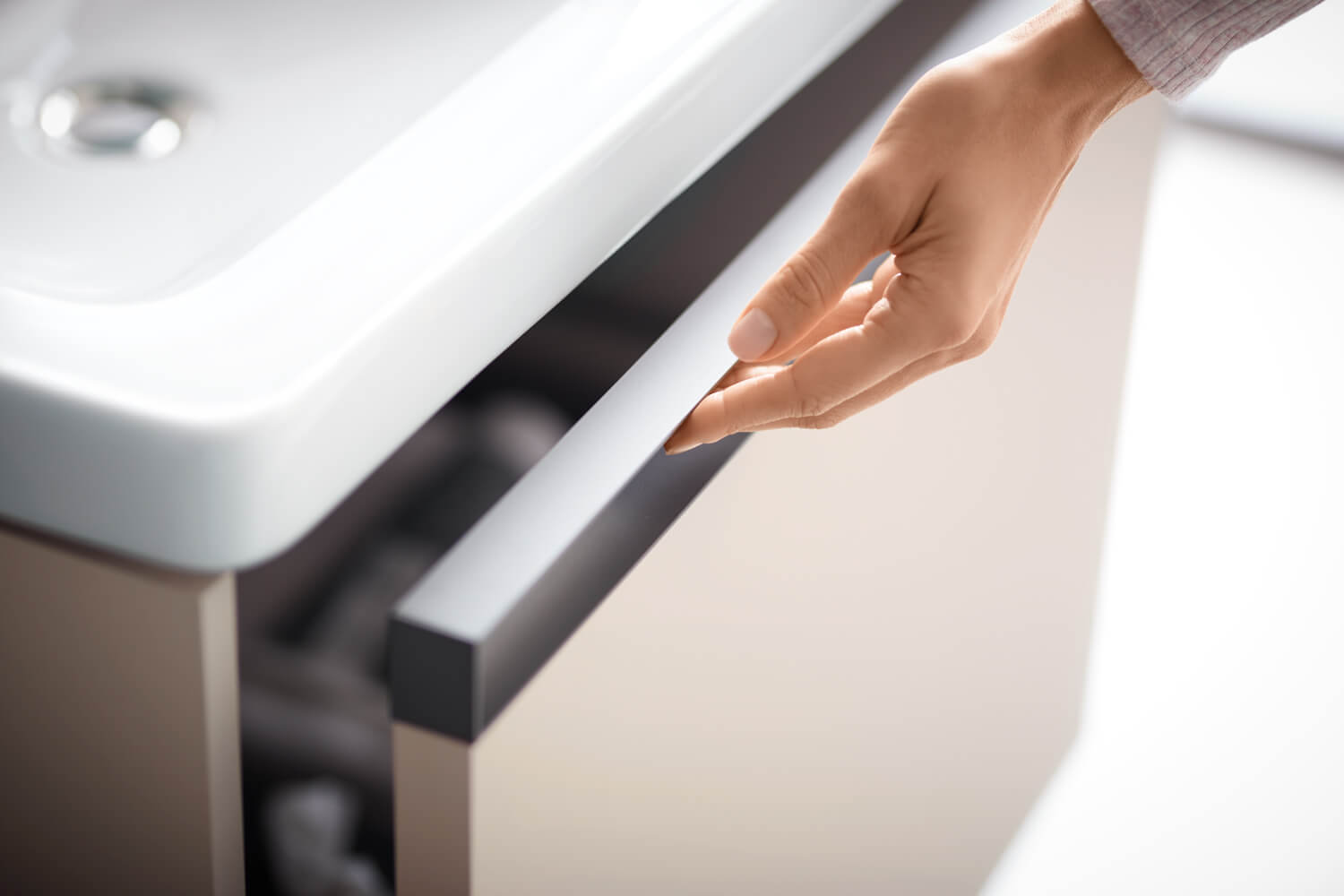 Opened drawer of a Ketho.2 vanity unit
