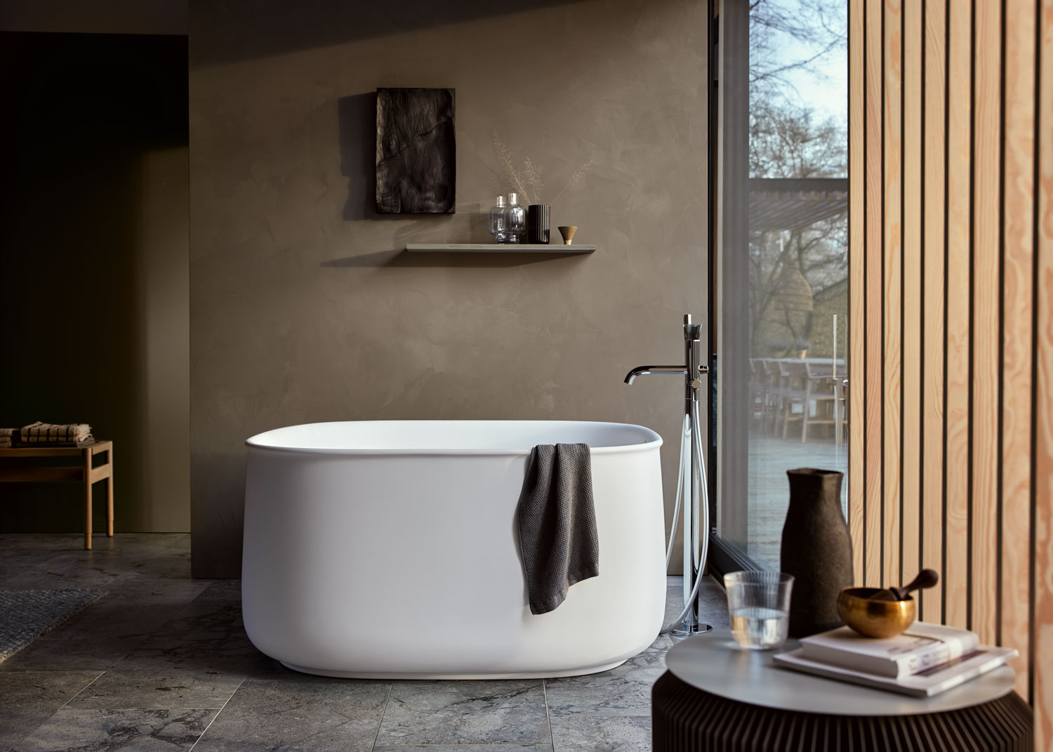 Natural bathroom with freestanding Zencha bathtub
