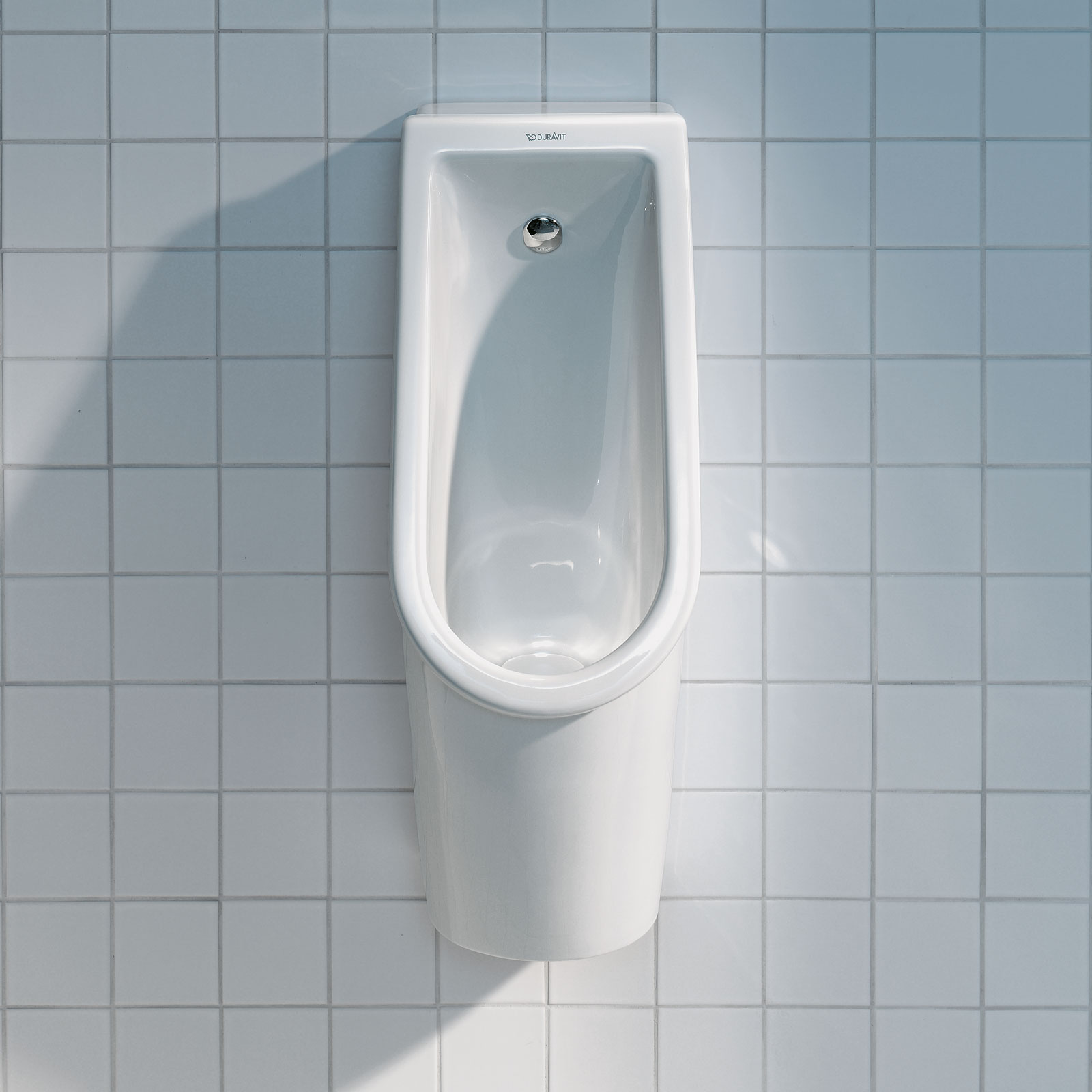 Starck 3 urinal on wall with tiles
