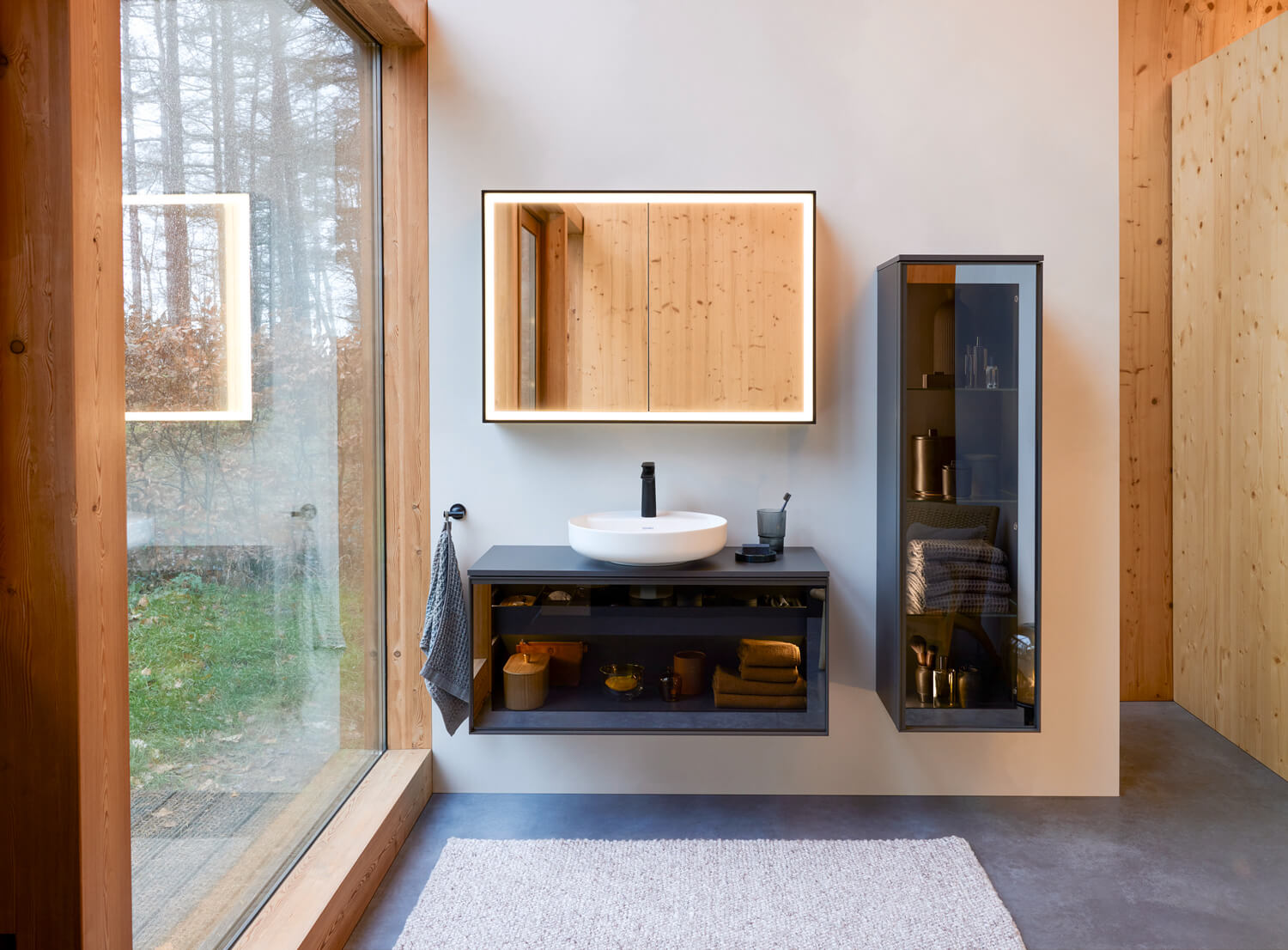 Sink area with dark Vitrium bathroom furniture
