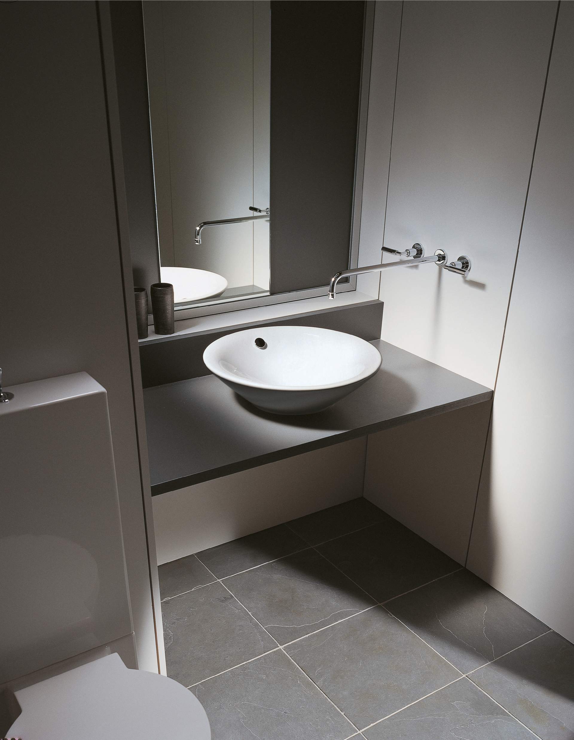 Barrier-free bathroom with height toilet
